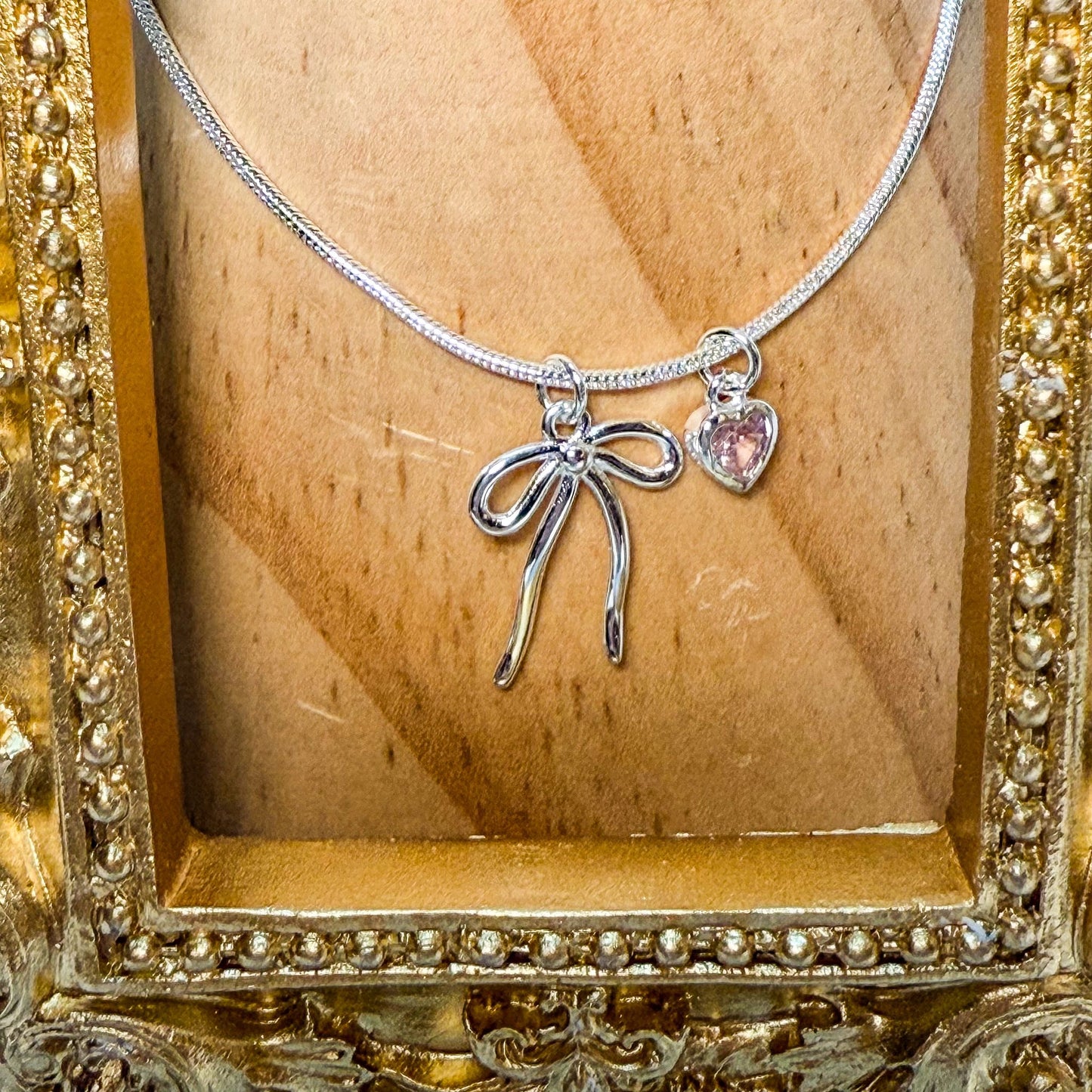 【 SWEETHEART PROMISE • 蝴蝶結鏤空愛心純銀項鍊 】
